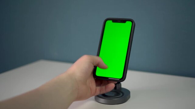 smartphone on magnetic station with wireless charg