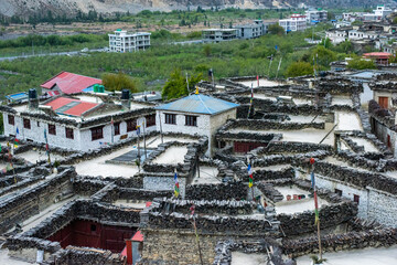 Traditional village in Nepal with stone-walled houses. Ancient Village Nestled in the Mountains of Nepal. Traditional Stone Houses in Marpha Village, Mustang