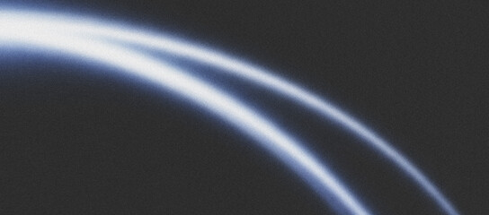 Abstract glowing blue light trails on dark background, futuristic and technological motion