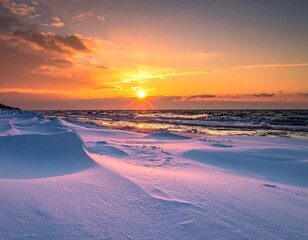 Winter sunset over a snowy beach