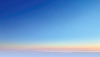 Obraz premium Pale sunrise over hazy, misty landscape