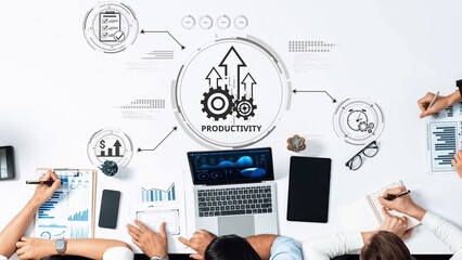 A modern business meeting focused on productivity strategies, showcasing diverse professionals collaborating with documents, charts, and technology in an efficient workspace. Raster
