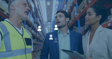 Operator scanning barcode sending overlay on tablet to management team reviewing warehouse shelves - Powered by Adobe