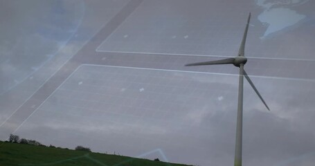 digital UI appearing on hill starting wind turbine spinning slowly clockwise showing power output - Powered by Adobe