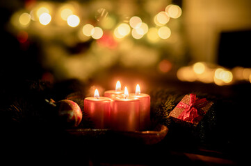  red Christmas Candle on rustic wood