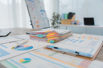 Businesswoman browsing through various documents, efficiently organizing files and managing paperwork in a bustling office environment, tackling deadlines and ensuring smooth operations