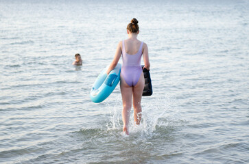 Children, boy and girl swimming, going swimming