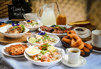 Tahitian Breakfast (poisson cru, fish, firi firi, coffee, juices) 