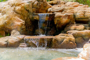 An artificial reservoir.

Decorative waterfalls and ponds in a mud clinic in Nha Trang.