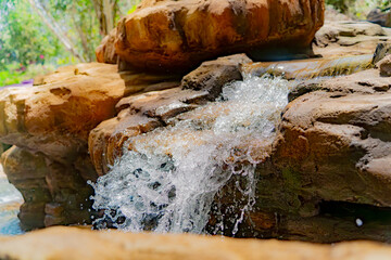 An artificial reservoir.

Decorative waterfalls and ponds in a mud clinic in Nha Trang.