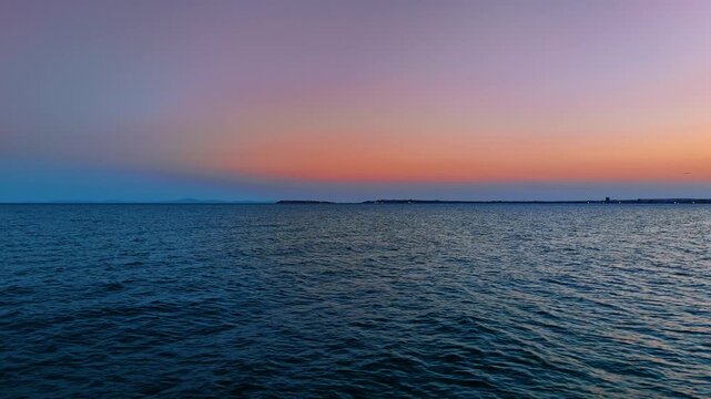 Sunset view over the Black Sea near Sveti Vlas, Bulgaria. Scenic view of the Black Sea during sunset with warm colors in the sky near Sveti Vlas resort, Bulgaria.
