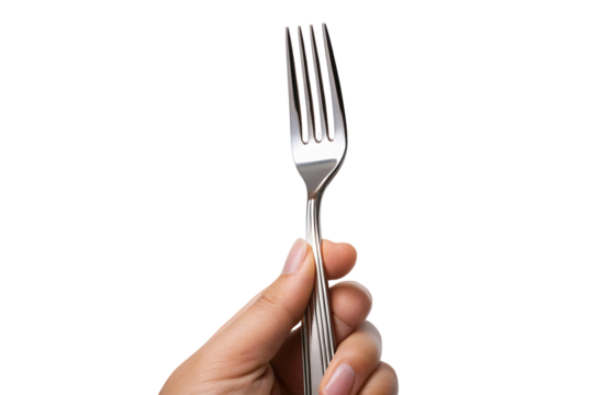 Person holding stainless steel fork in hand against black background tableware utensil image