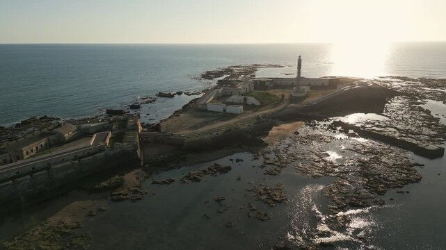 Drone video of the Avanzada de Santa Isabel at sunset, Cadiz, southern Spain.