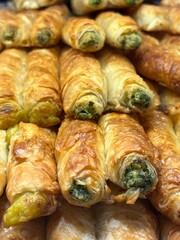 Cheese phyllo pastry pie with spinach in a bakery 