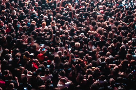 Aerial view of concert crowd mosh pit motion