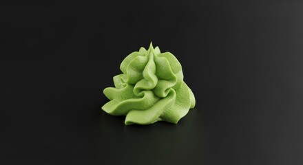 Swirl of green puree on dark background