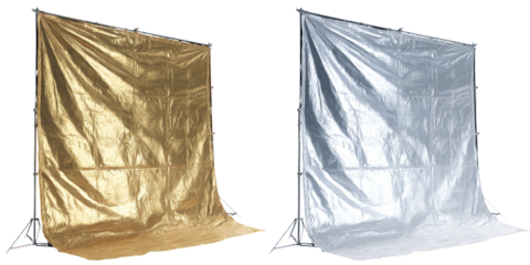 Two photographic backdrops, gold and silver, on tripods