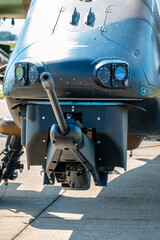 The main rapid-fire modern machine gun under the helicopter, movement controlled by the pilot's helmet