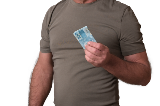 Goiânia, Brazil, September 17, 2025: Financial value of Brazilian real notes. Man holding money in cedula. Economy.