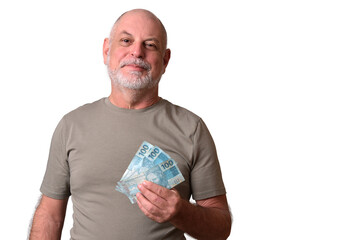Financial value of Brazilian real notes. Man holding money in cedula. Economy.