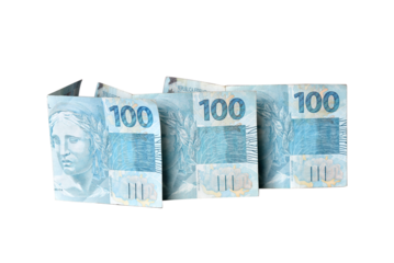 Goiânia, Brazil, September 17, 2025: Financial value of dollar and Brazilian real banknotes.