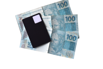 Goiânia, Brazil, September 17, 2025: Financial value of dollar and Brazilian real banknotes.