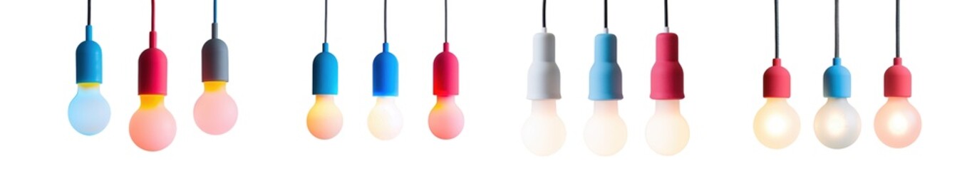 Assortment of colorful decorative light bulbs hanging, isolated on transparent background