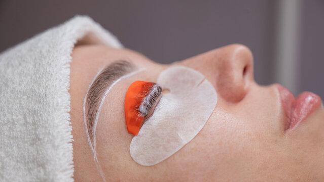 The process of professional lamination and dyeing of eyelashes and eyebrows in the salon. - Powered by Adobe