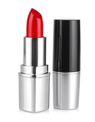Obraz premium A vibrant red lipstick displays in its elegant metallic and black container against a plain white background.