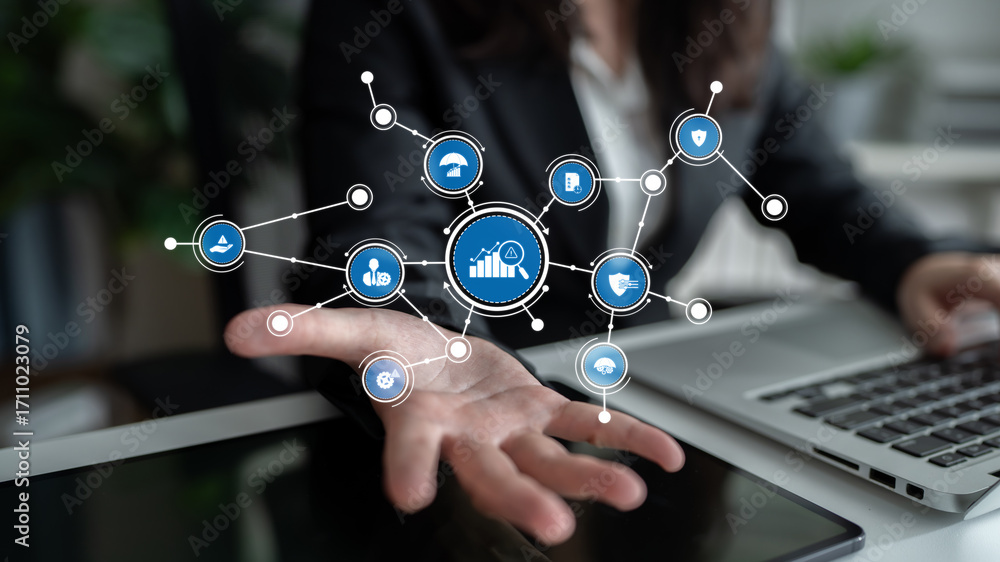 Poster a professional hand displaying virtual data visualization and growth indicators in a modern office s