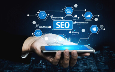A businessman holds a smartphone displaying innovative SEO graphics, emphasizing digital marketing strategies and modern data analysis in today competitive landscape. Tessel