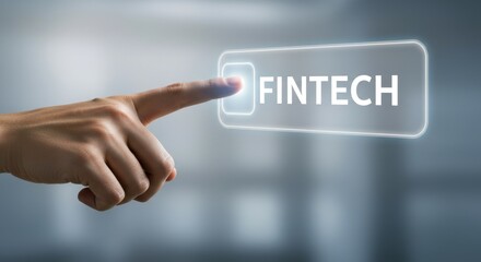 Hand pressing a glowing button with the word FINTECH, symbolizing digital financial innovation and online payment solutions