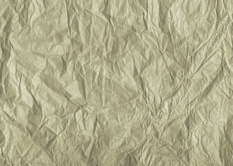 Wrinkled olive color paper texture. Old crumpled wavy paper antique background.	