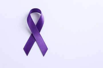 Purple Ribbon Symbolizing Awareness and Support for Various Causes, Isolated on White Background with Copy Space