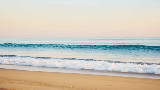 Turquoise Wave Crashing on Sandy Beach Under Pale Sky at Dawn Water Splashing Seashore Tranquil Golden Light Coastal Seascape