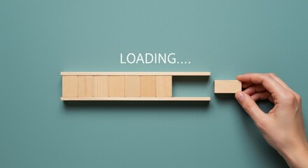 Conceptual image of a loading bar being completed by a hand, symbolizing progress and completion