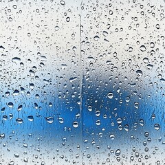 A seamless background of dynamic water droplets on a transparent surface, with a blurred blue sky and a white divider visible through the drops.