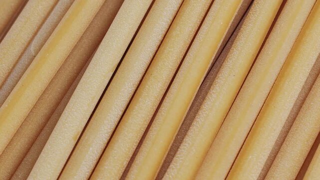 Italian pasta Bucatini or perciatelli thick spaghetti like pasta with a hole running through the center 