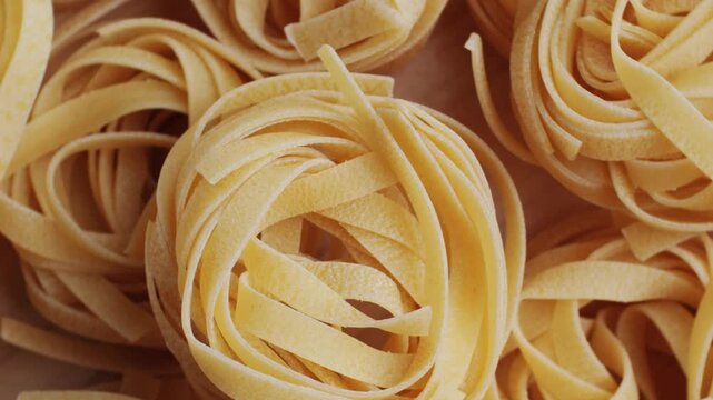 Italian tagliatelle pasta packaging window, Fettuccine pasta, close up, not cooked