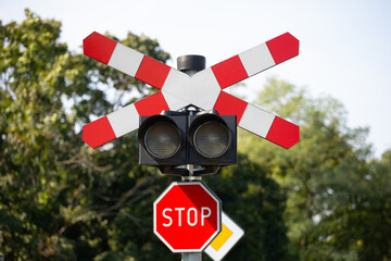 Znak stop przy przejeździe kolejowym Krzyż świętego Andrzeja / Stop sign at railway crossing