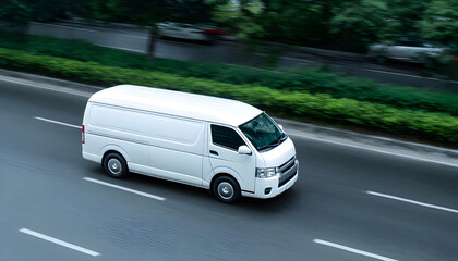 White delivery van on highway road.