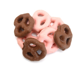 Colorful chocolate covered pretzels on white background