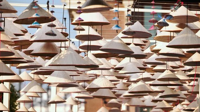 Traditional Vietnamese Conical Hats Hanging in Moscow During Vietnam Days