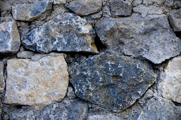 Natural stone wall texture as background