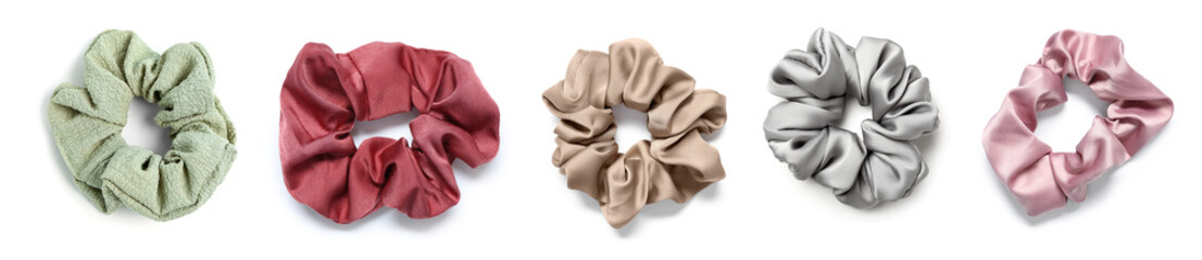 Set of stylish hair scrunchies on white background