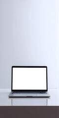 Fototapeta premium Sleek modern silver laptop computer open with a blank white screen front view.