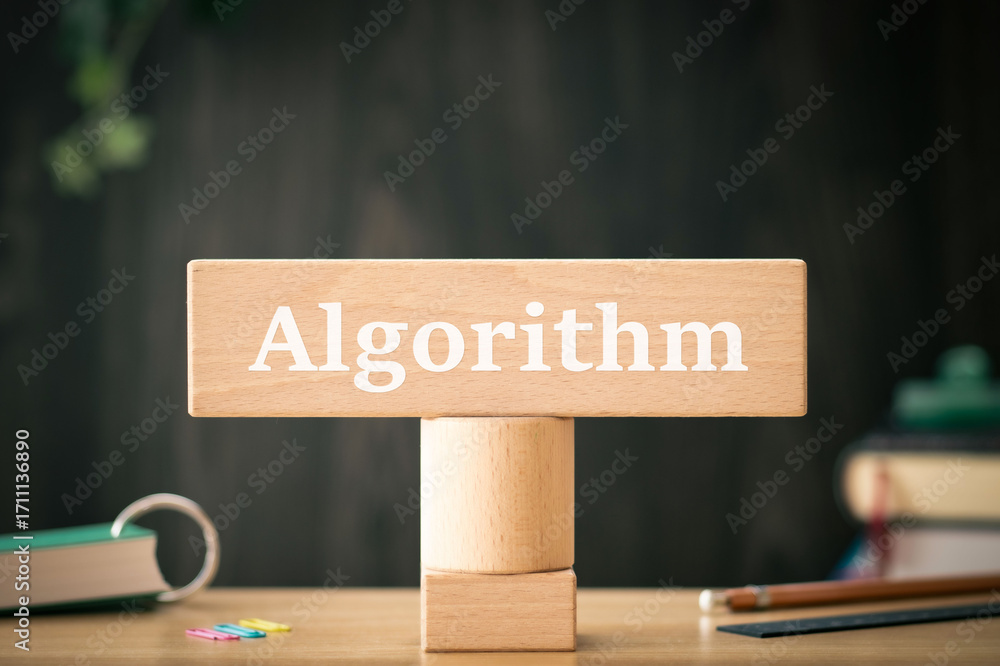 Poster there is wood block with the word algorithm. it is as an eye-catching image.