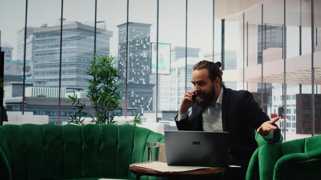 Furious outraged director screaming at associate on phone call, dealing with staff incompetence due to ineffective bad leadership. Annoyed rude businessman criticizing the team. Camera A.