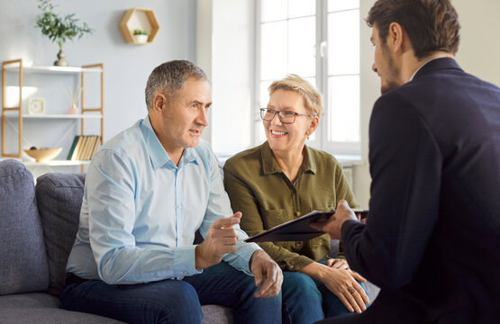 Senior couple, family buyers or sellers visiting realtor, agent, discussing insurance agreement, real estate contract, adult elderly meeting with lawyer, solicitor, broker common deal, help, advice