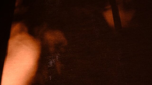 Mystery shadows on red blood background, grunge night moments, noise, soft blurred and cinematic. Horror. Mystery silhouettes.  Spooky surreal movie